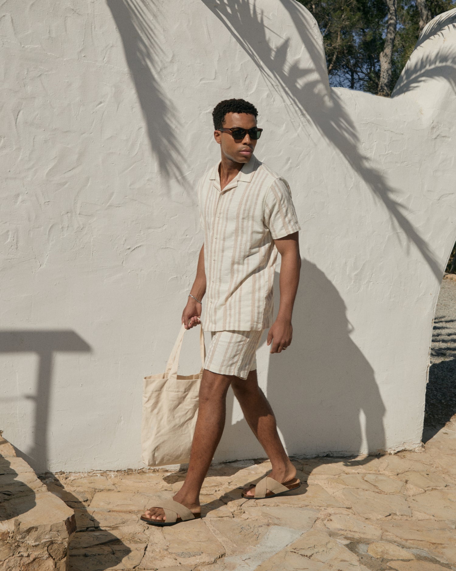 Threadbare Textured Cotton Shirt & Shorts Co-ord in Stone Chevron Stripe worn by man on holiday