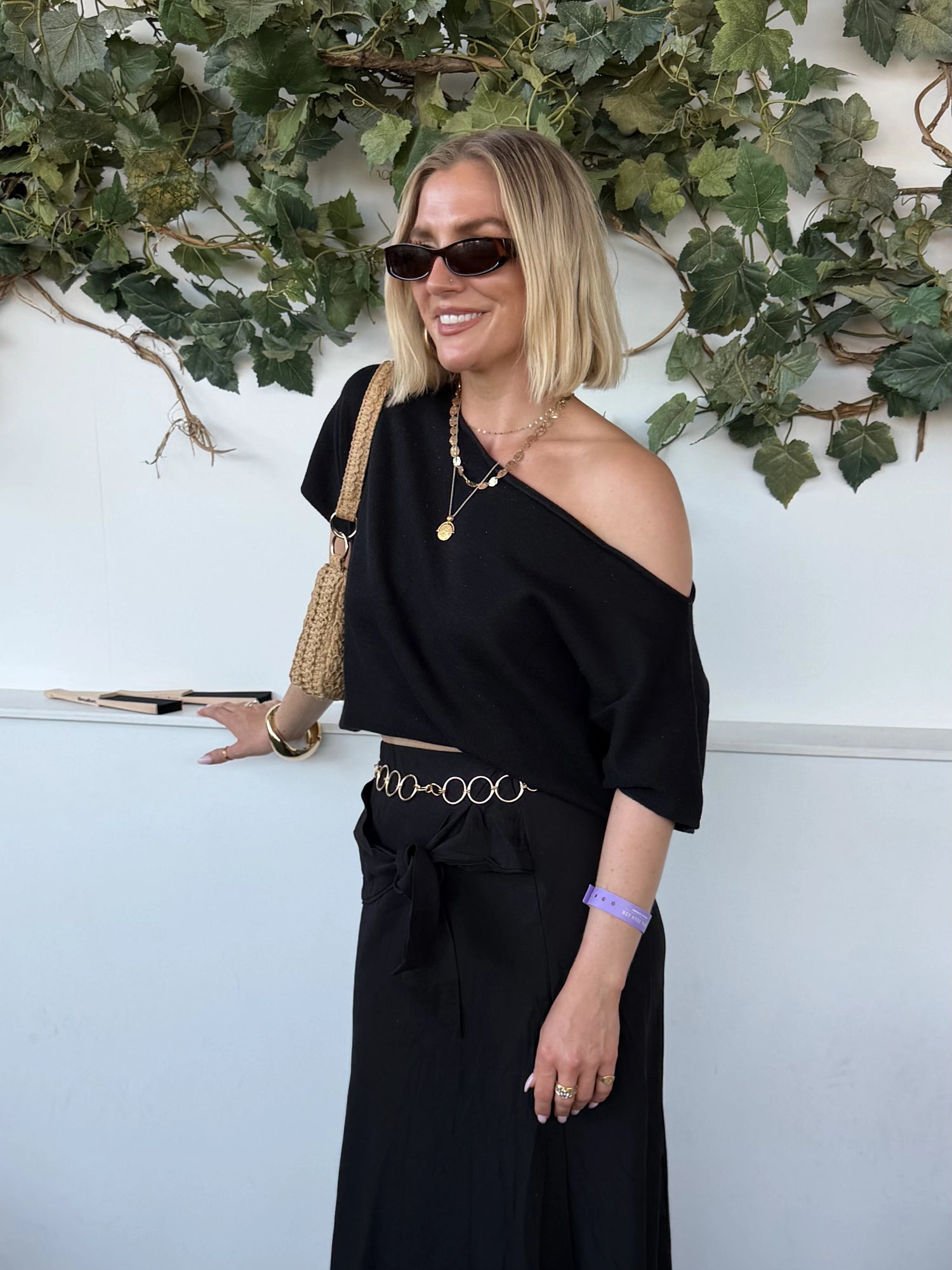 Sarah wearing our Short Sleeve Slash Neck Jumper & Tie Sash Maxi Skirt in Black.