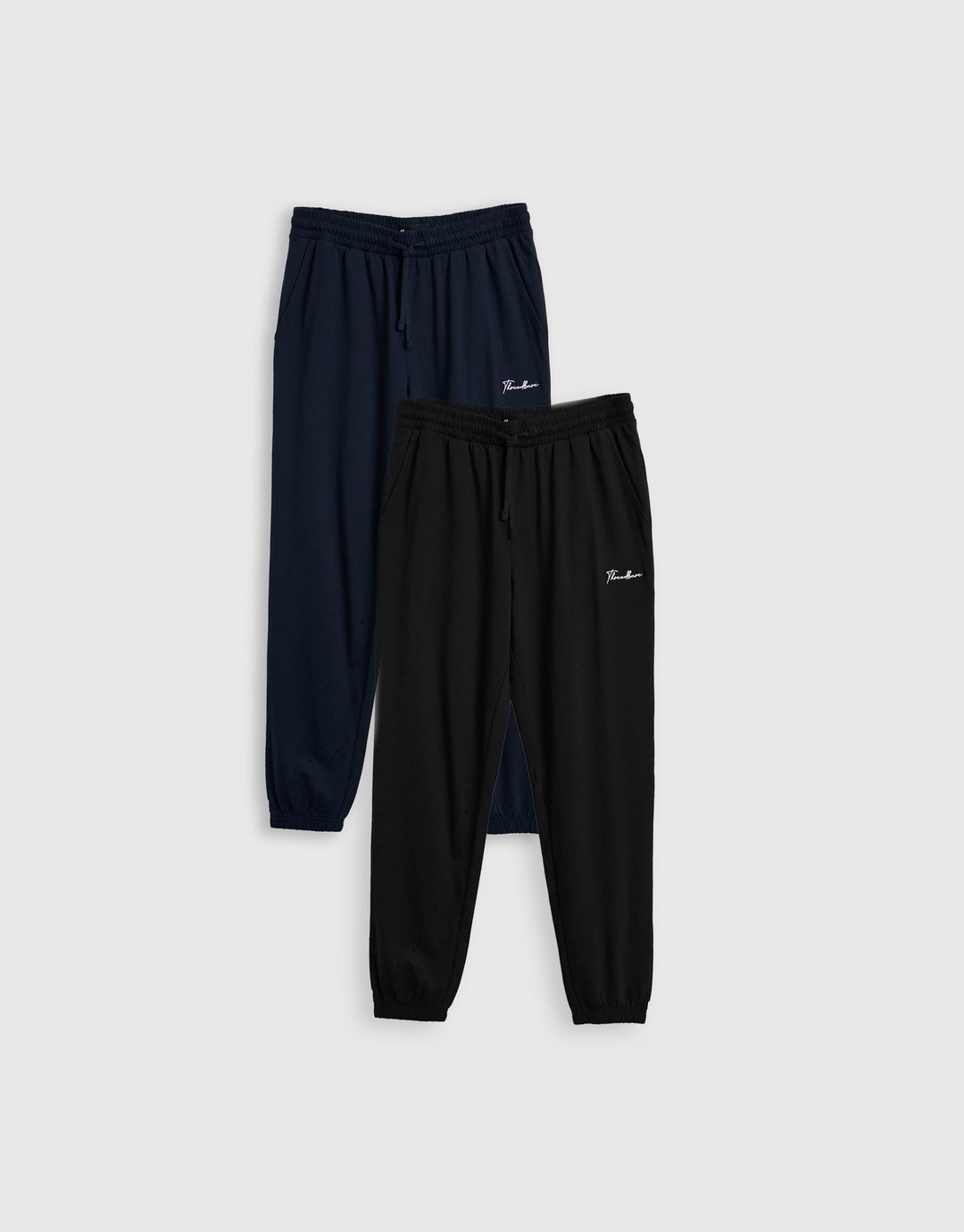 Threadbare 2 Pack Cuffed Joggers in Black & Navy - flat lay