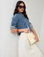 Threadbare Denim Jacket with Patch Pockets in Mid Wash - front view with sunglasses
