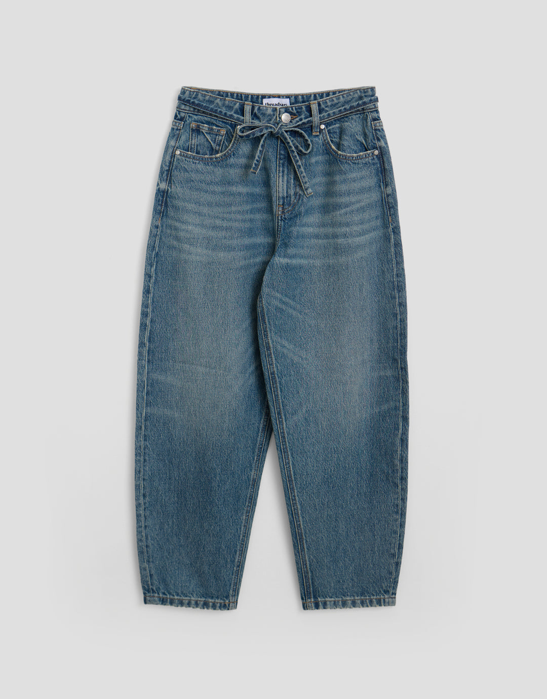 Threadbare Tie Belt Barrel Leg Jeans in Mid Wash - flat lay