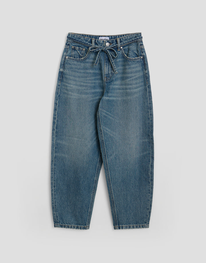 Threadbare Tie Belt Barrel Leg Jeans in Mid Wash - flat lay