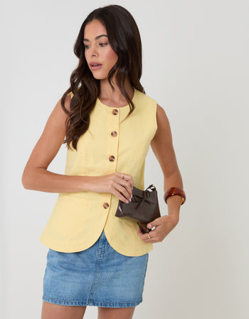 Threadbare Linen Blend Longline Waistcoat in Yellow - front view with handbag