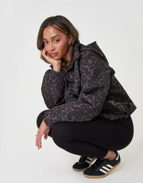 Threadbare Showerproof Funnel Neck Rain Mac in Leopard Print - sat down
