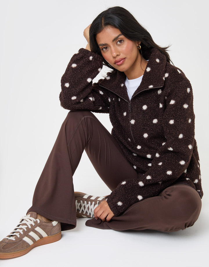 Threadbare Quarter Zip Fleece in Chocolate Brown Polka Dot - sat down