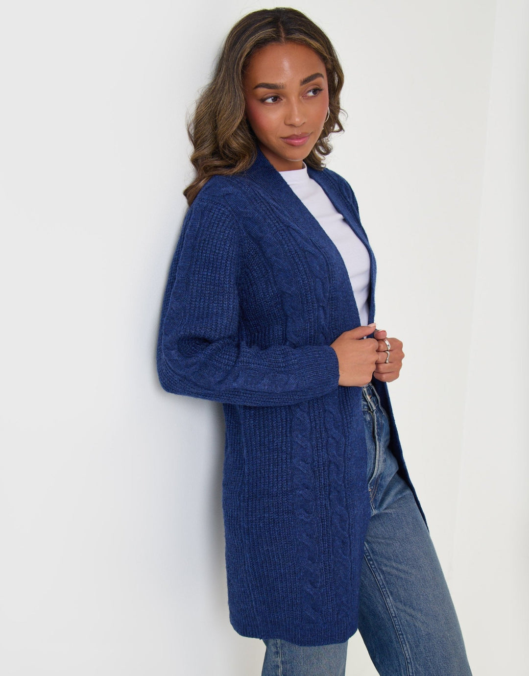 Threadbare Cable Knit Cardigan in Navy - wall pose 