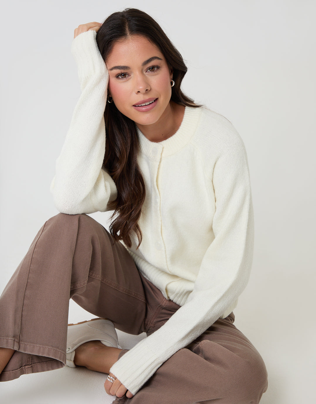 Threadbare Button Up Knitted Cardigan in Cream - seated