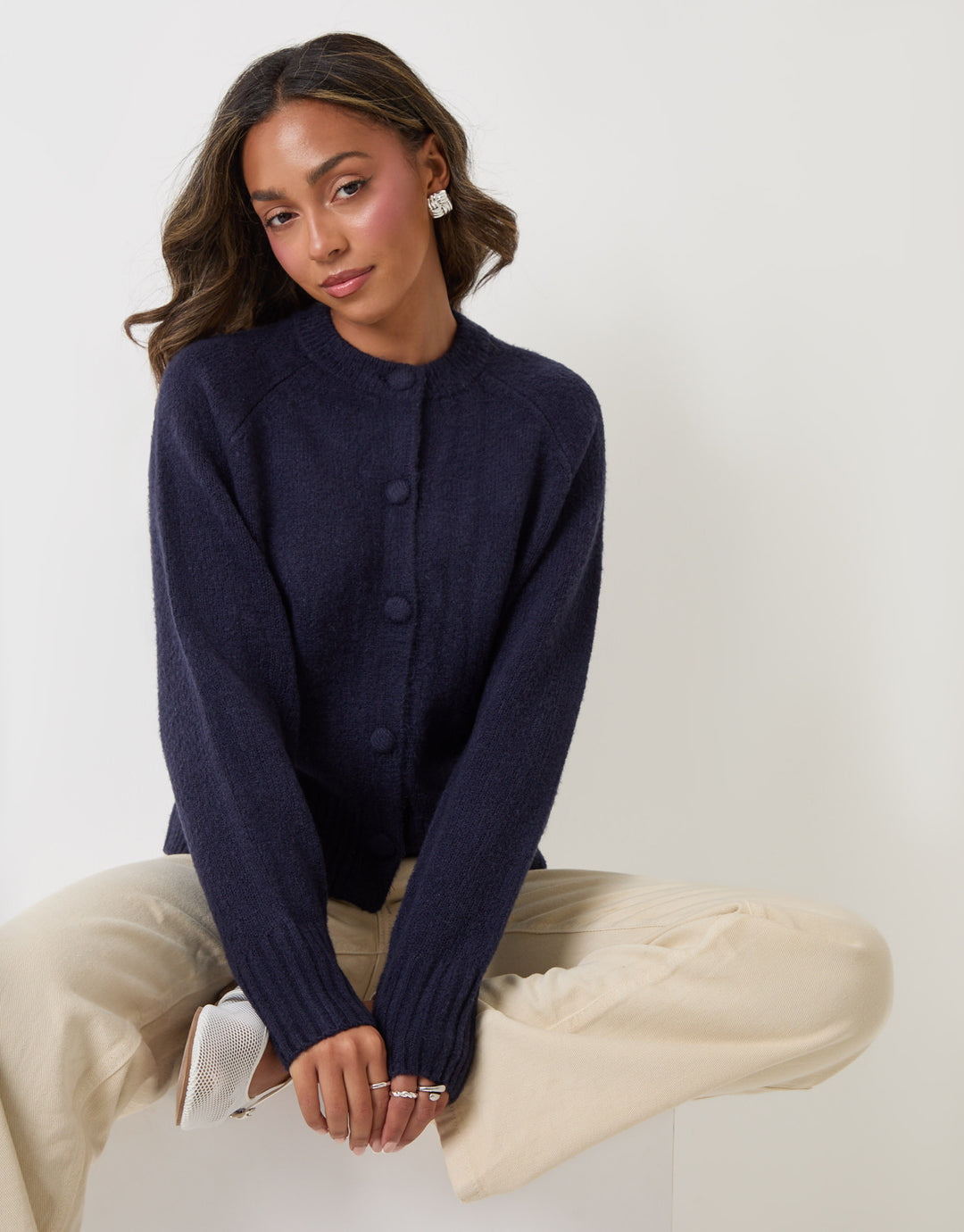 Threadbare Relaxed Fit Knitted Cardigan in Navy - sat down