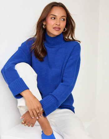 Threadbare Relaxed Fit Funnel Neck Jumper in Blue - sat down