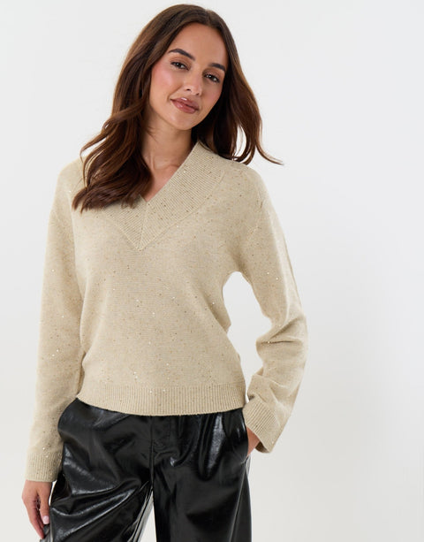 Threadbare Sequin V Neck Knitted Jumper in Ecru - hand on hip side view