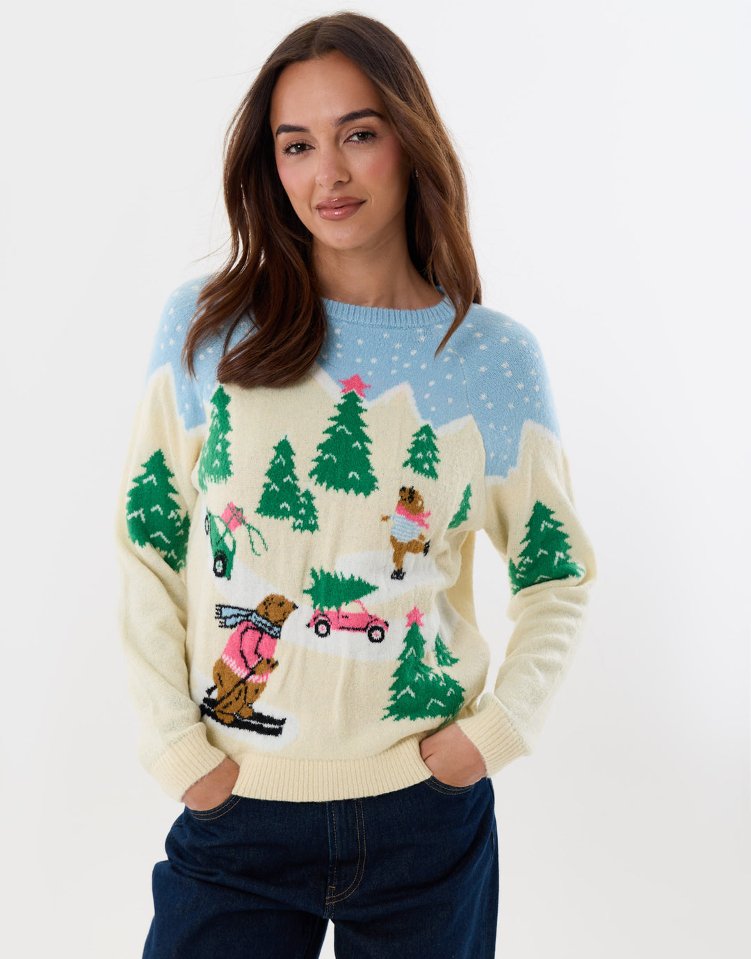 Threadbare Winter Scene Knitted Christmas Jumper in Beige - hand on hip front view