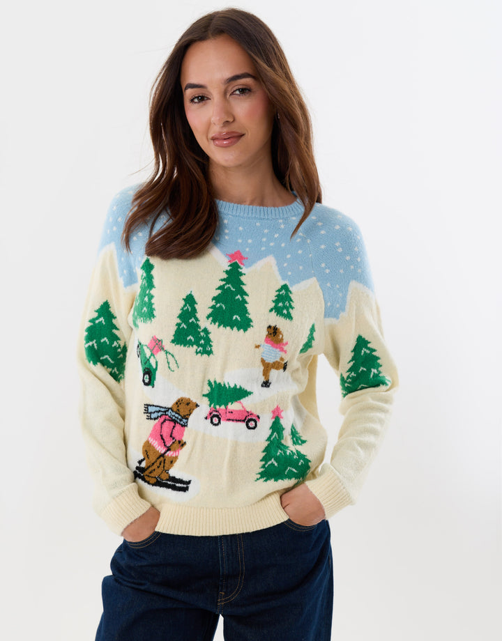 Threadbare Winter Scene Knitted Christmas Jumper in Beige - hand on hip front view