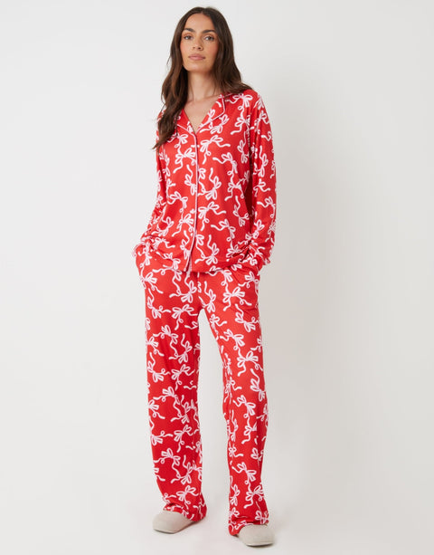 Threadbare Long Button-Through Christmas Pyjama Set in Red Bow Print - full body