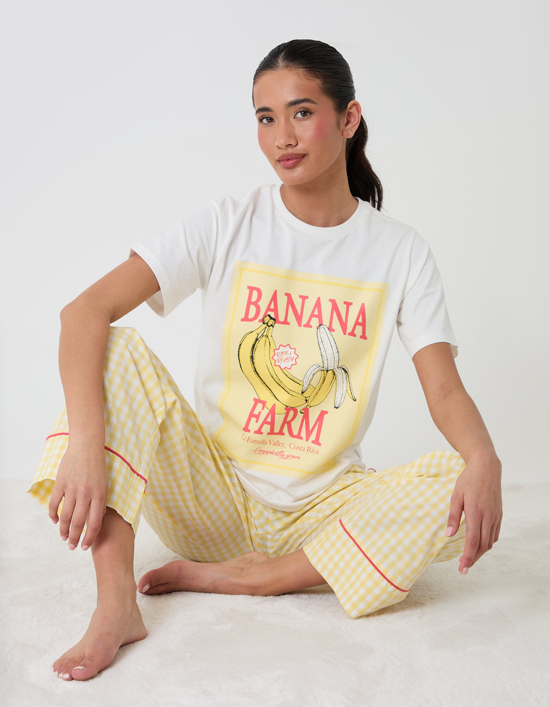 Threadbare Cotton Banana Farm Print Pyjama Set in Yellow Check - seated