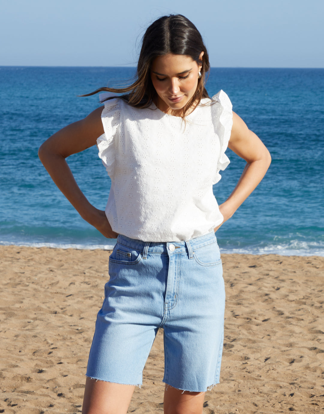 Raw Hem Denim Bermuda Shorts in Light Wash