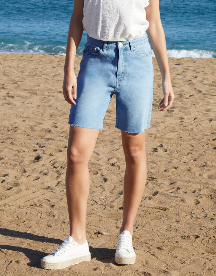 Raw Hem Denim Bermuda Shorts in Light Wash