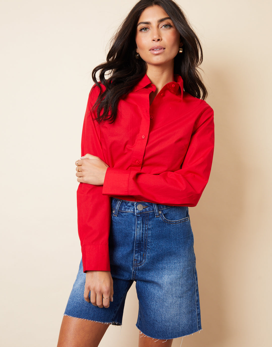 Raw Hem Denim Bermuda Shorts in Mid Wash