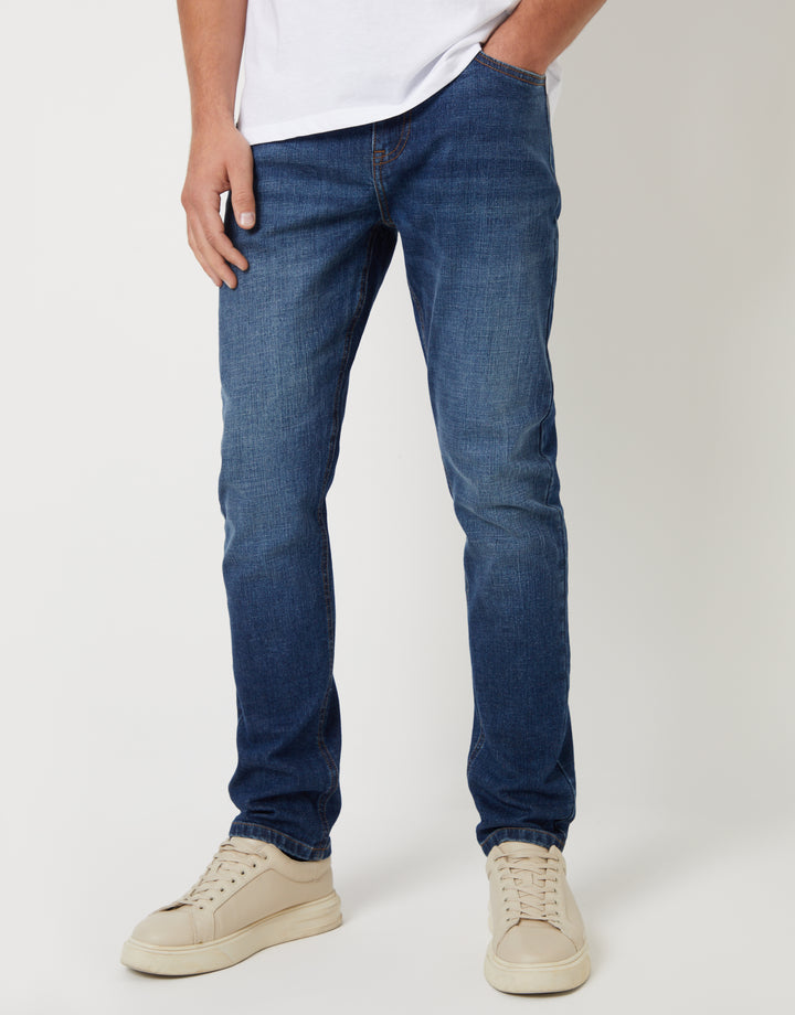 Mid Wash Stretch Heritage Tapered Jeans