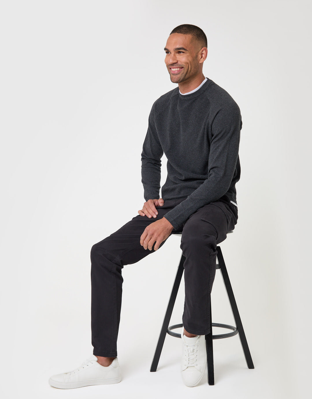 Threadbare Slim Fit Cargo Style Trouser in Black - sat down