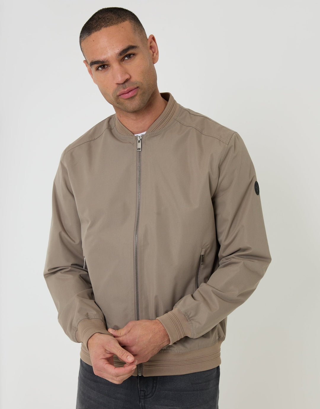 Threadbare Showerproof Classic Bomber Jacket in Taupe - front view, zipped up