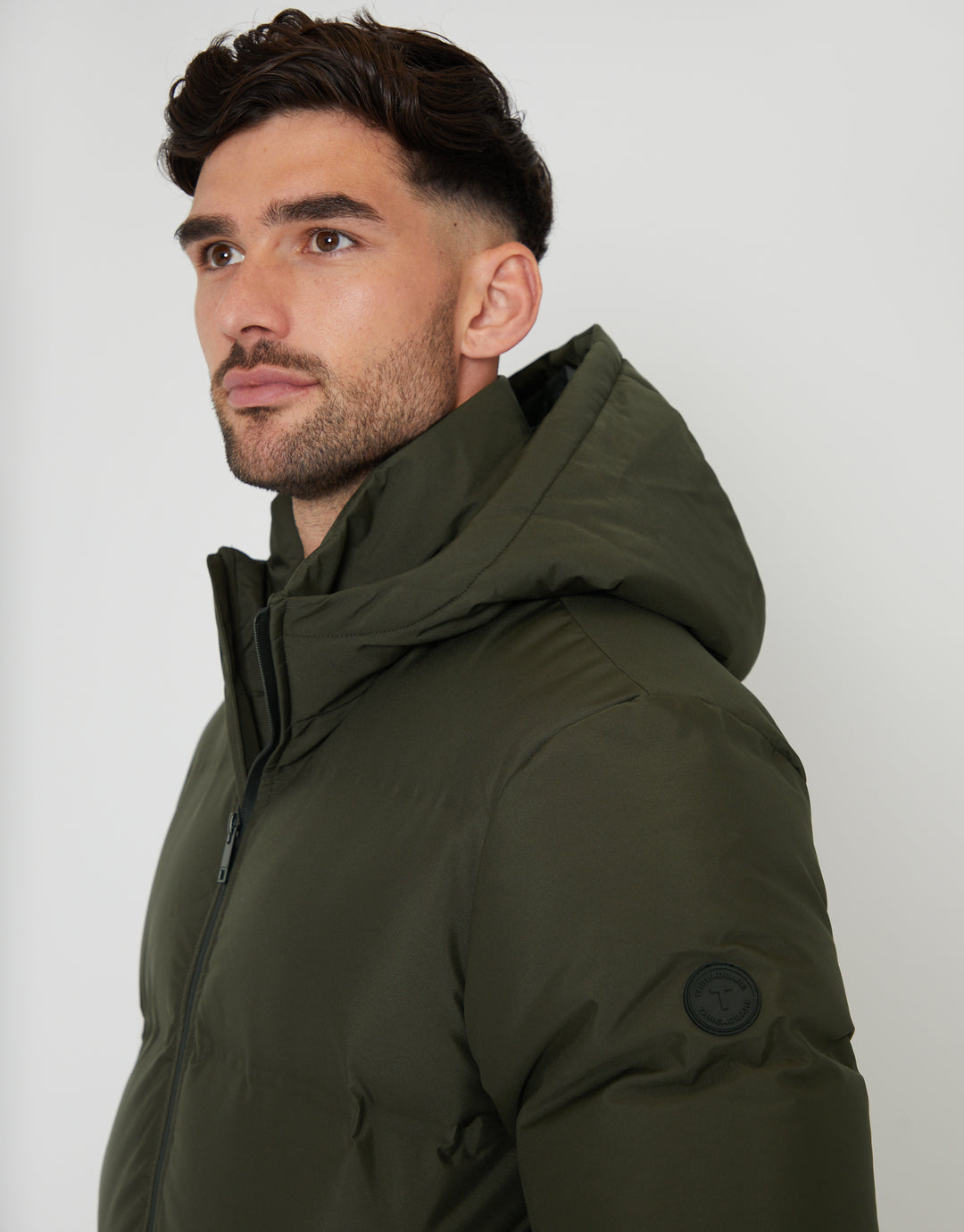 Threadbare Hooded Puffer Jacket in Khaki Green - side view close up