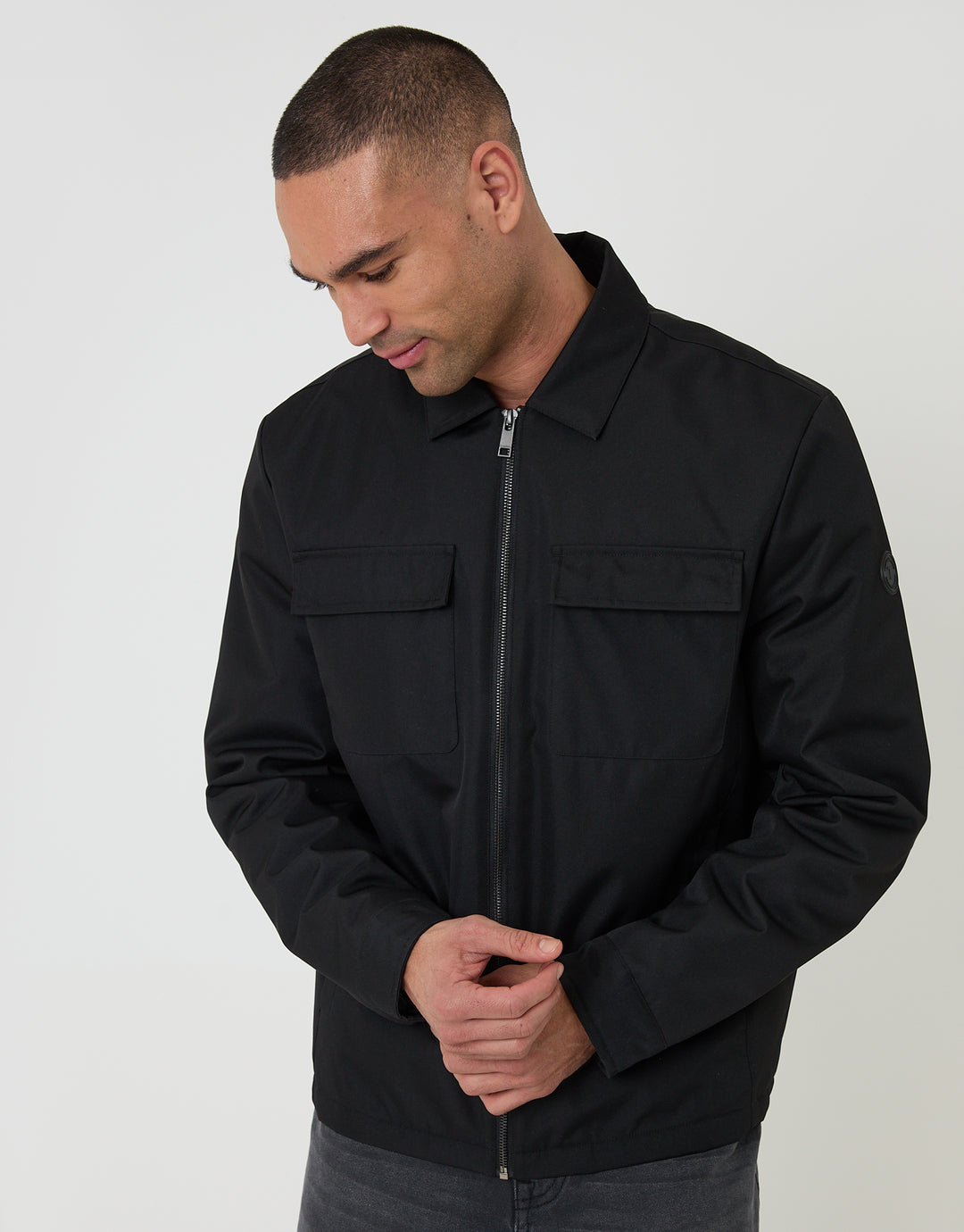 Threadbare Showerproof Lightweight Collared Zip Up Jacket in Black - front view, zipped up
