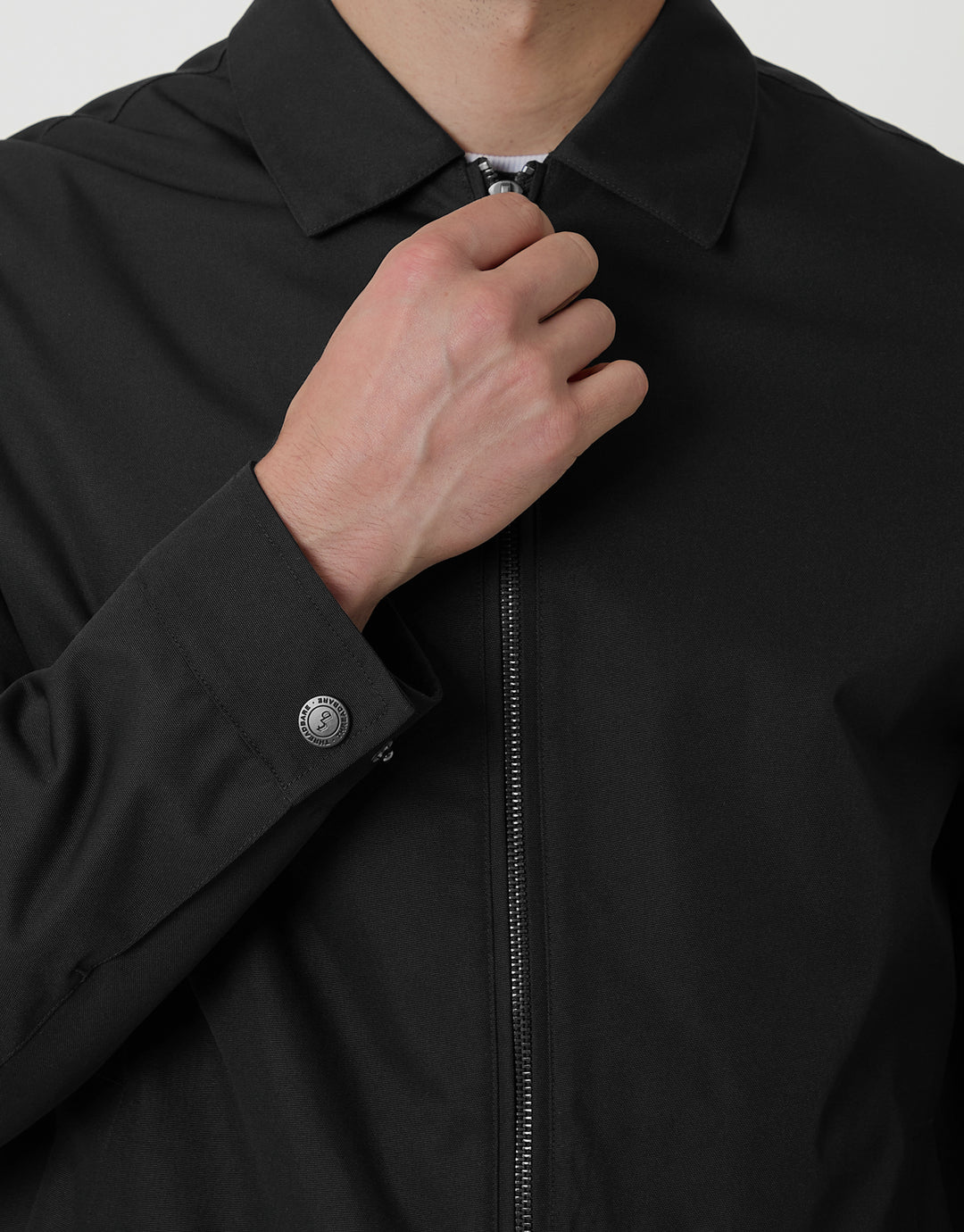 Showerproof Lightweight Collared Zip Through Jacket in Black - close up zip
