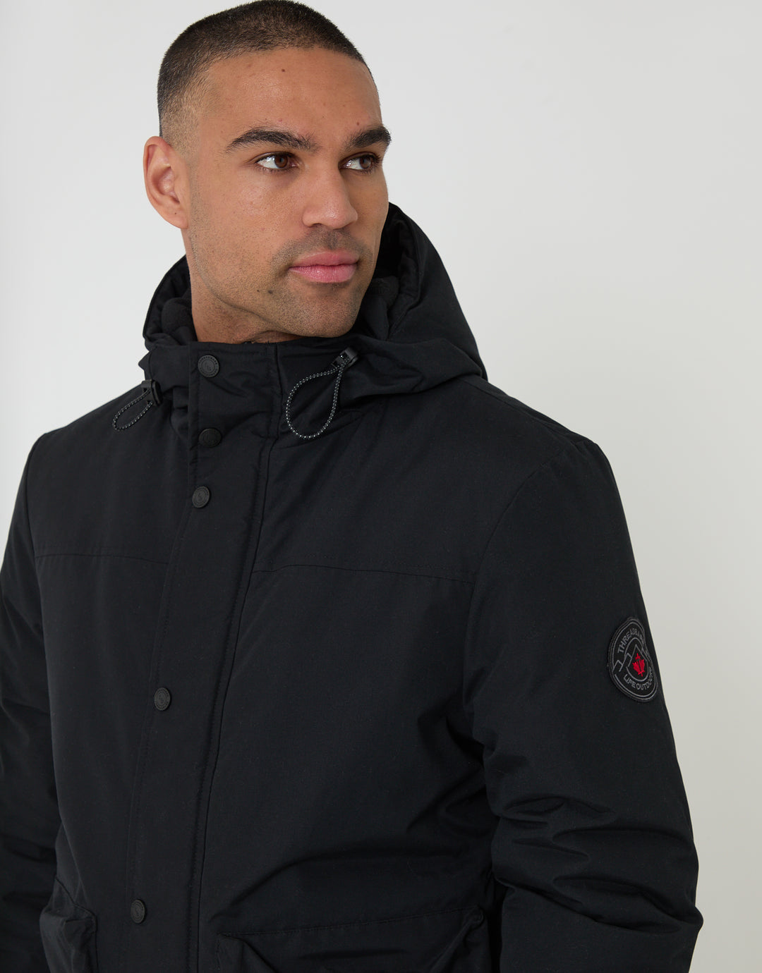 Threadbare Showerproof Microfleece Lined Padded Coat in Black - front view close up 