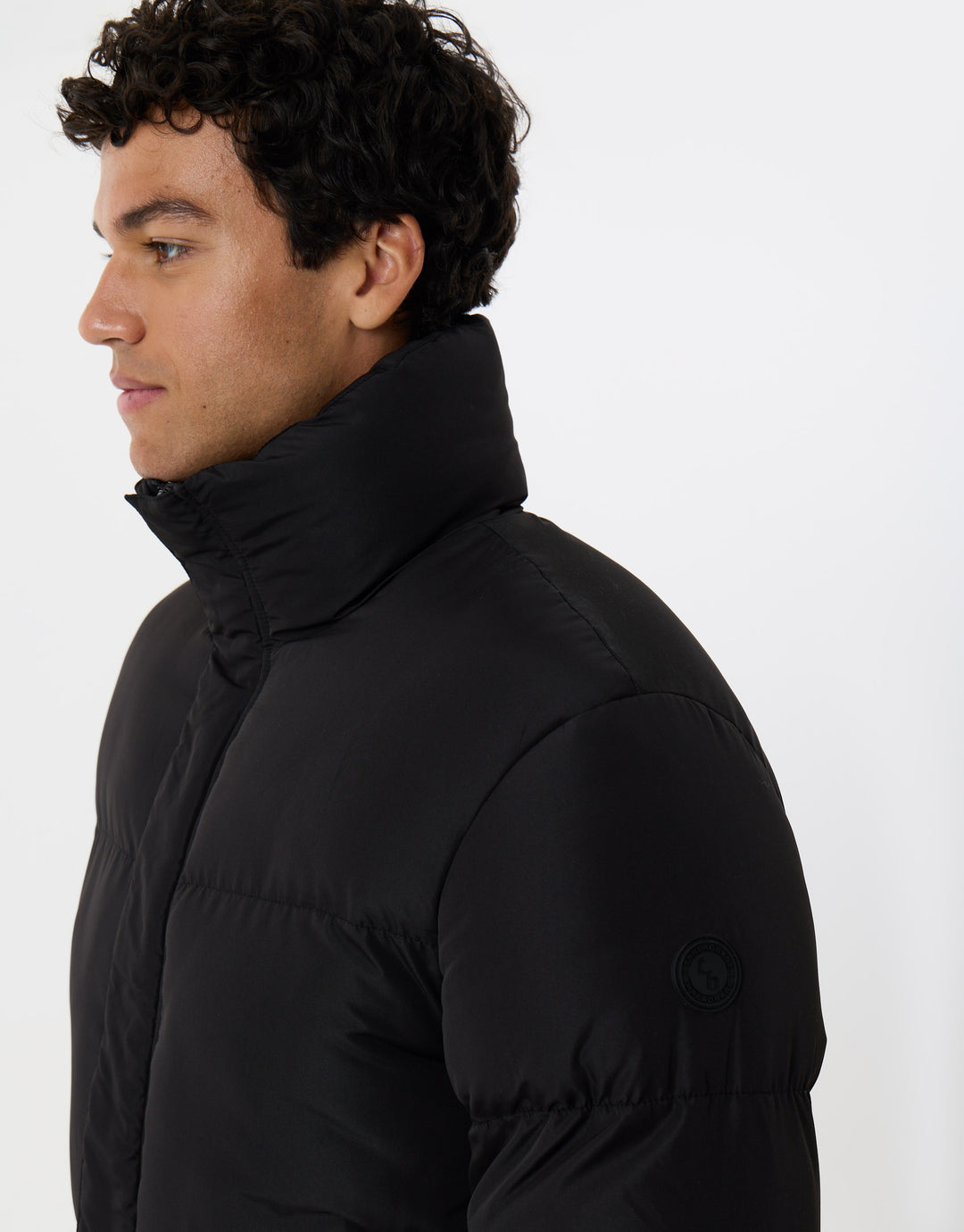 Showerproof Funnel Neck Puffer Coat in Black