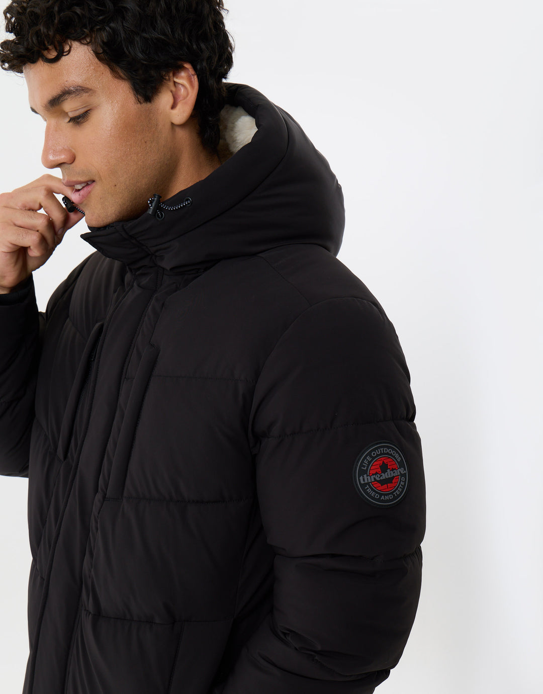 Showerproof Padded Jacket with Sherpa Lined Hood in Black