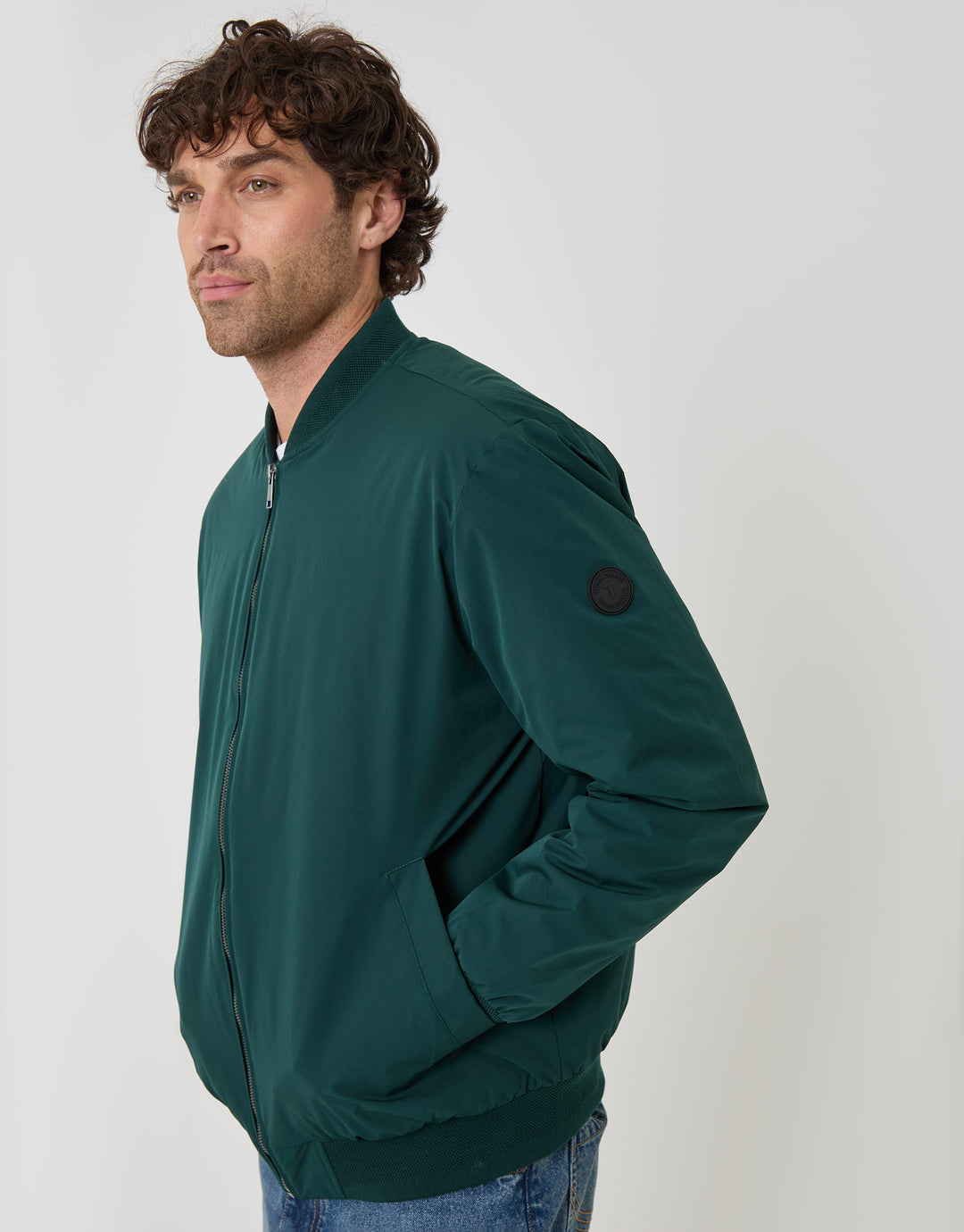 Threadbare Showerproof Padded Bomber Jacket in Green - side view