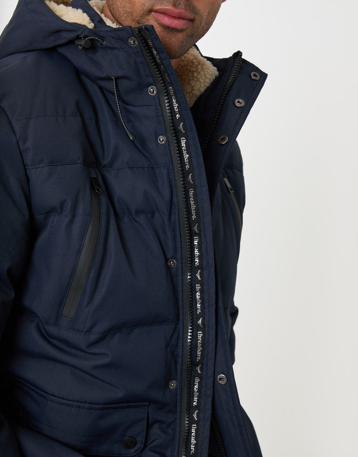 Threadbare Showerproof Hooded Puffer Coat with Borg Lined Hood in Navy - close up