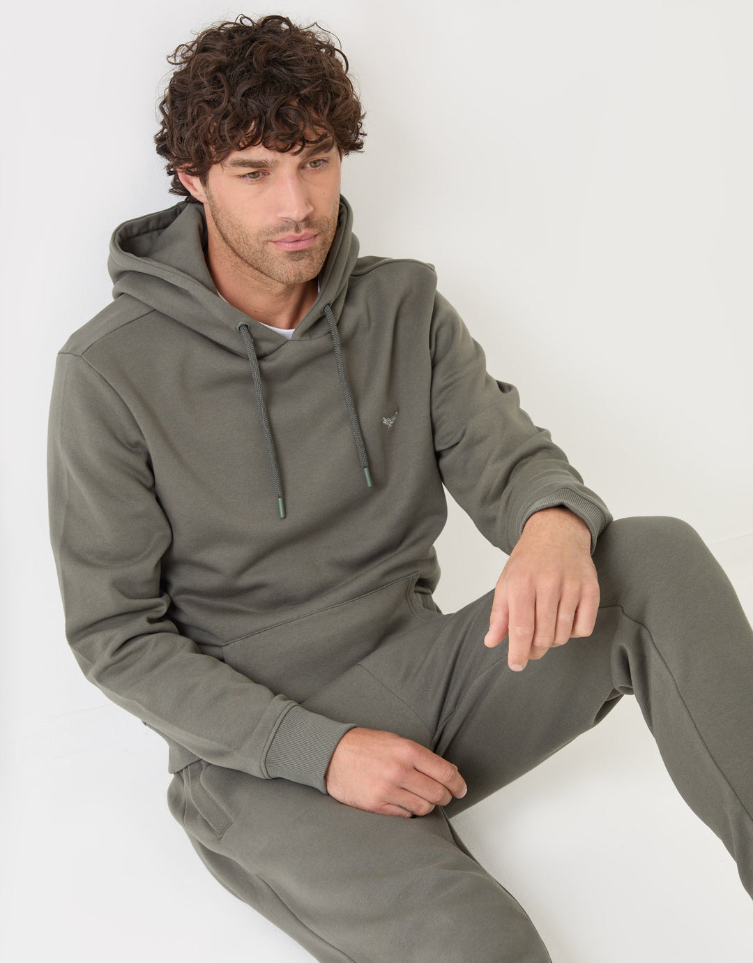 Threadbare Cotton Rich Overhead Hoodie in Dark Sage - sat down