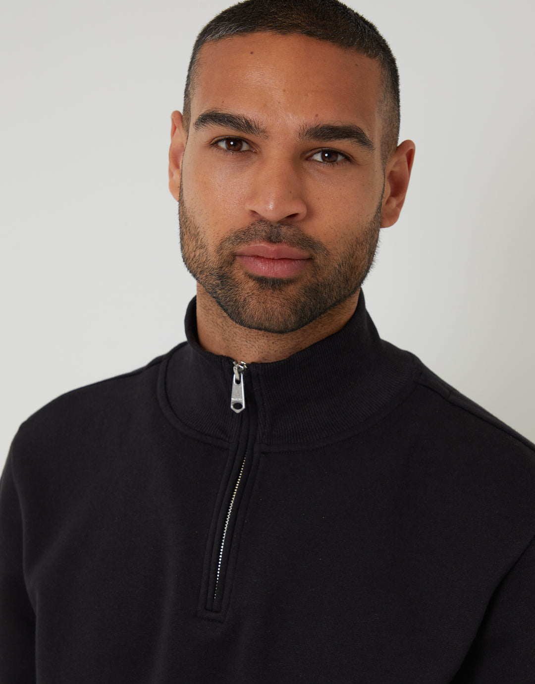 Threadbare Mock T-Shirt Quarter Zip Sweatshirt in Black - front view close up