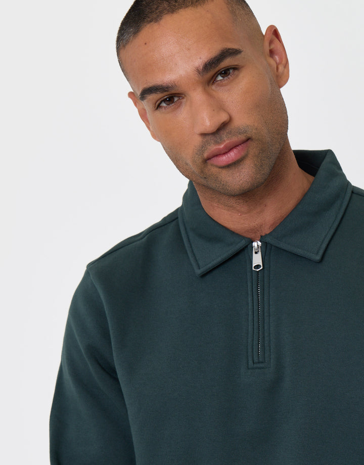 Threadbare Cotton Rich Quarter Zip Polo Sweatshirt in Forest Green -  close up