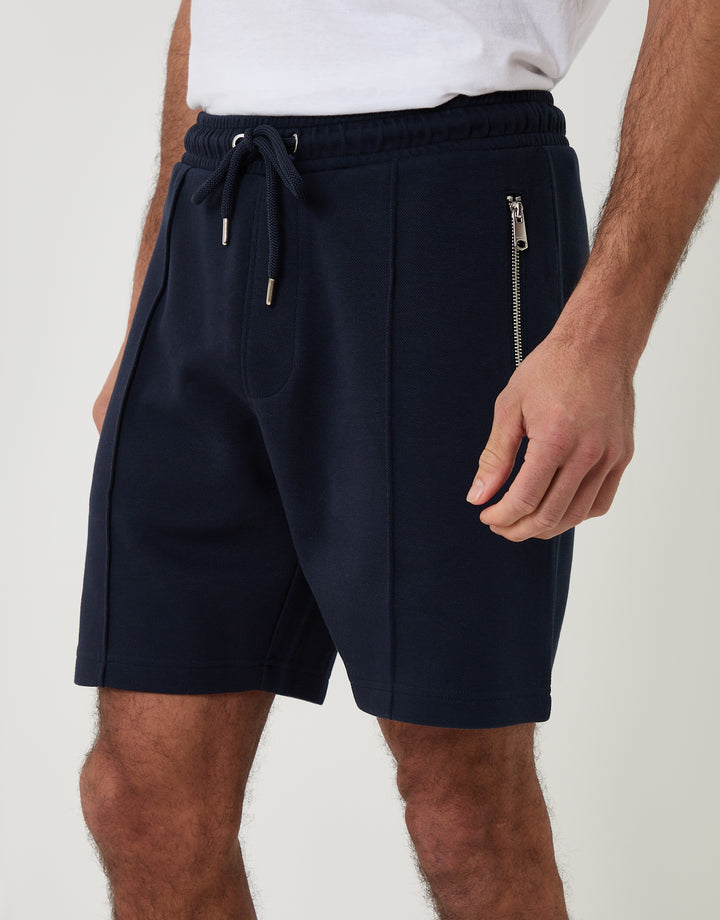 Threadbare Pique Pleated Sweat Shorts in Navy - front view close up
