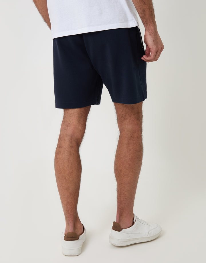 Threadbare Pique Pleated Sweat Shorts in Navy - back view