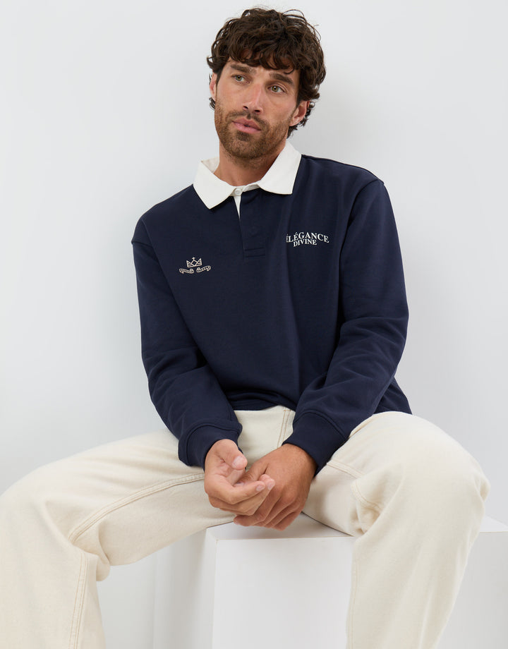 Threadbare Relaxed Fit Divine Graphic Print Rugby Polo in Navy - sat down