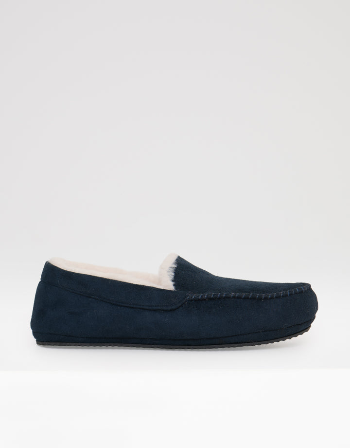 Threadbare Faux Suede Faux Fur Lined Moccasin Slippers in Navy - side view
