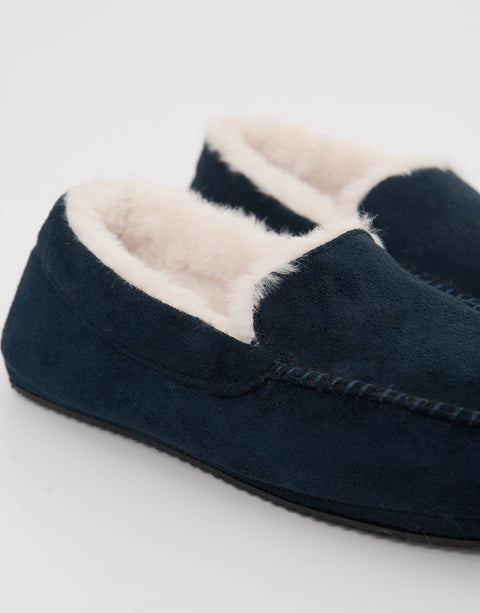 Threadbare Faux Suede Faux Fur Lined Moccasin Slippers in Navy - side view close up