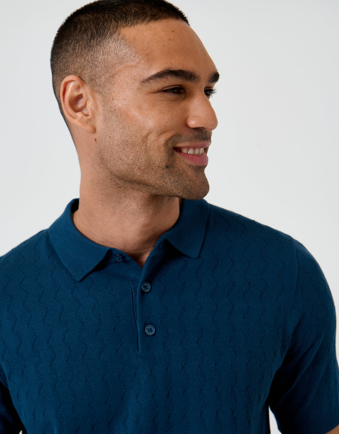 Threadbare Zig Zag Stitch Knitted Polo in Denim Blue - front view close up