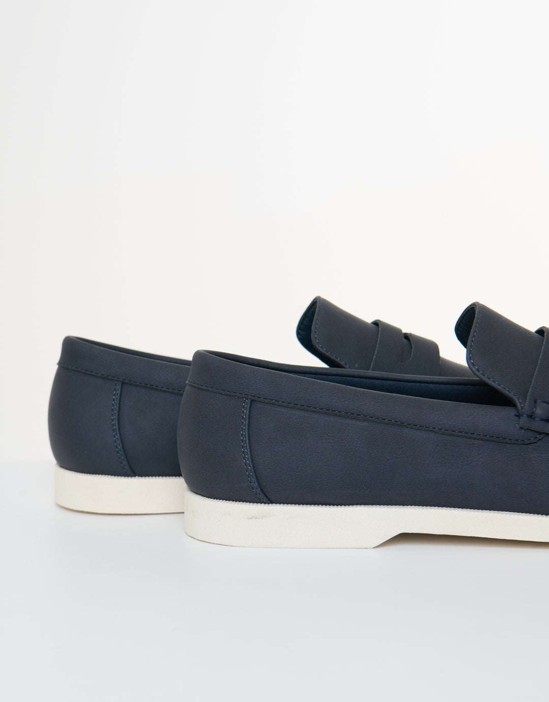 Threadbare Faux Suede Penny Loafers in Navy - side view close up