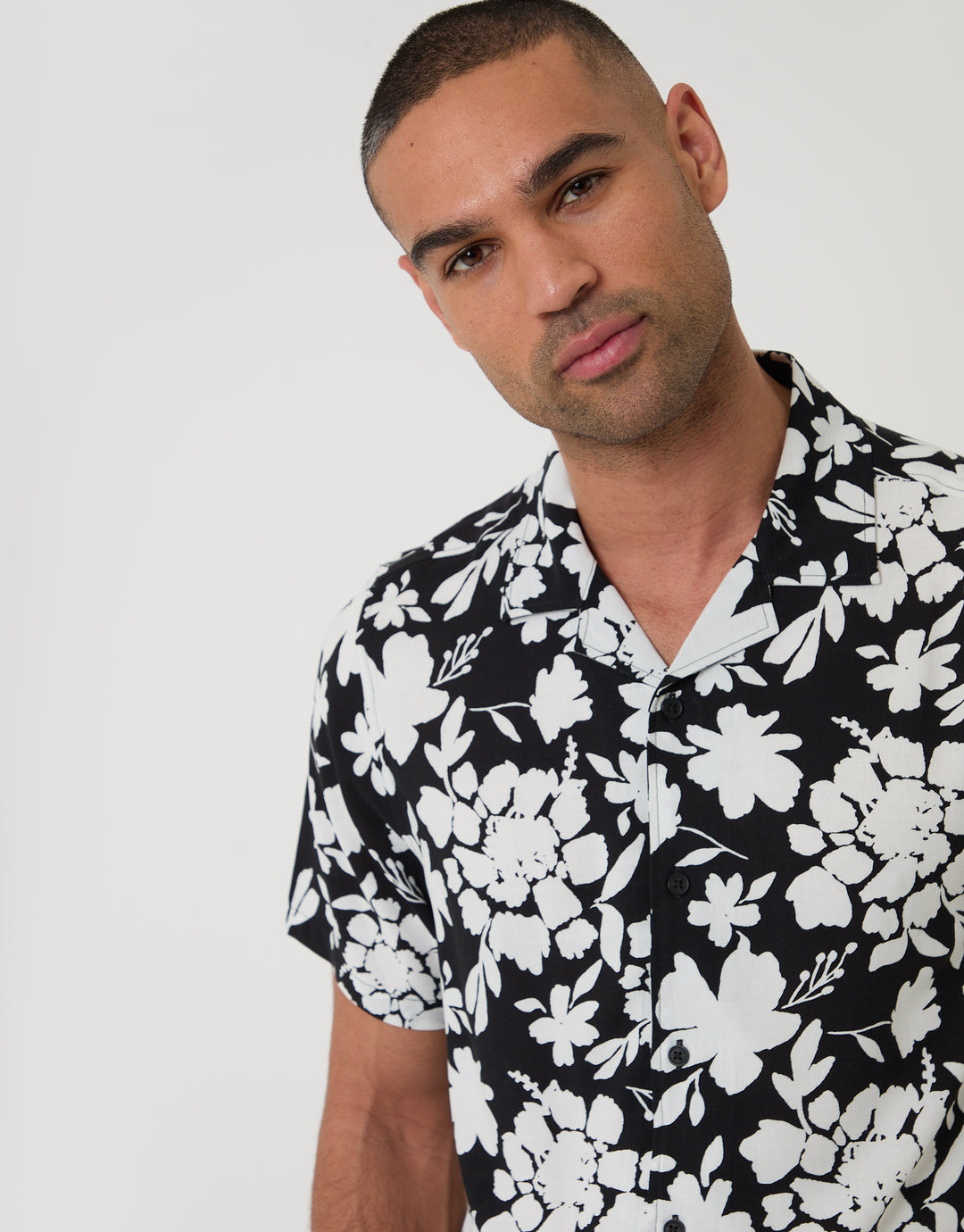 Threadbare Abstract Floral Print Short Sleeve Shirt in Black - front view close up