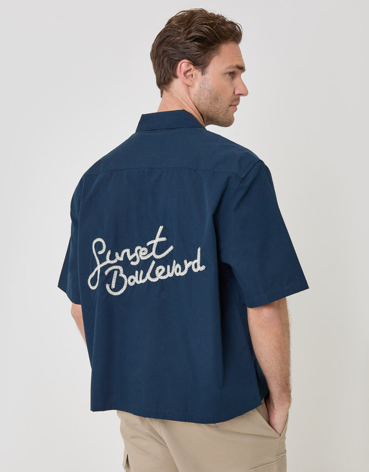 Threadbare Boxy Fit Sunset Boulevard Embroidered Short Sleeve Shirt in Navy - back view