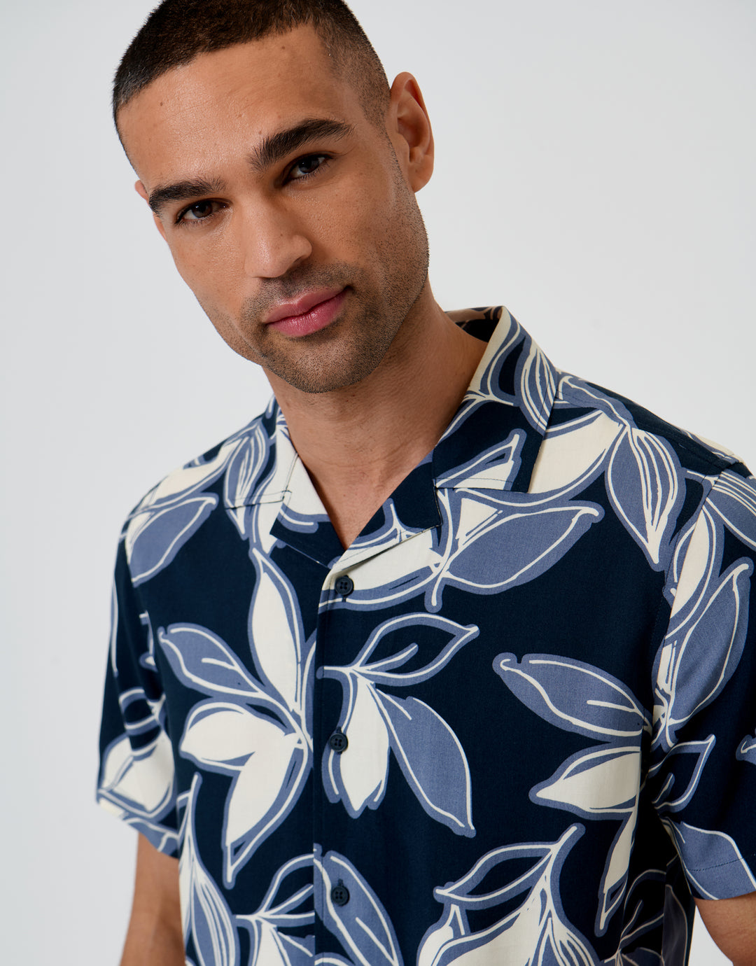 Threadbare Leaf Print Short Sleeve Shirt in Navy - front view close up