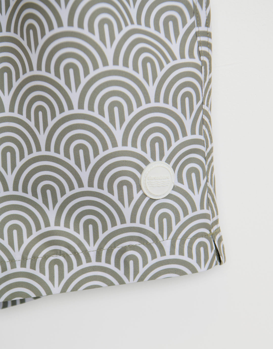 Threadbare Quick Dry Swim Shorts in Sage Green Geo Arch Print - badge close up