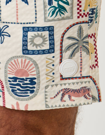 Threadbare Tropical Stamp Print Seersucker Swim Shorts in Cream - badge close up
