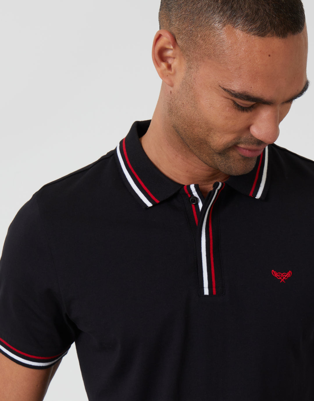 Threadbare Contrast Tipping Hidden Placket Polo Shirt in Black - front view close up