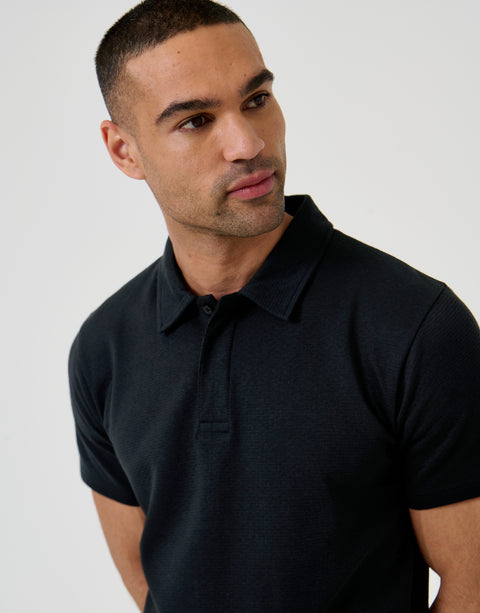 Threadbare Textured Hidden Placket Polo Shirt in Black - front view close up