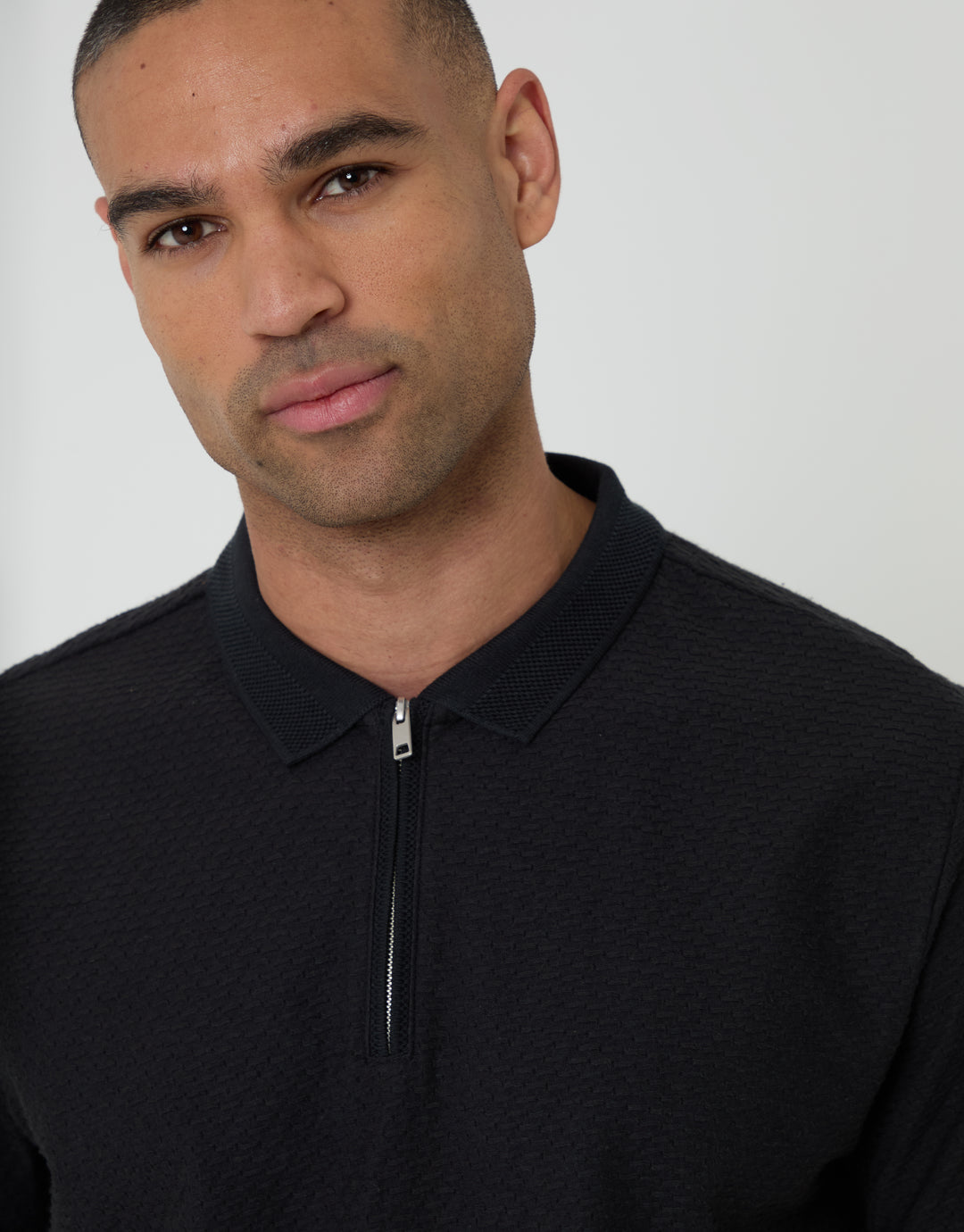 Threadbare Textured Quarter Zip Polo Shirt in Black - collar close up